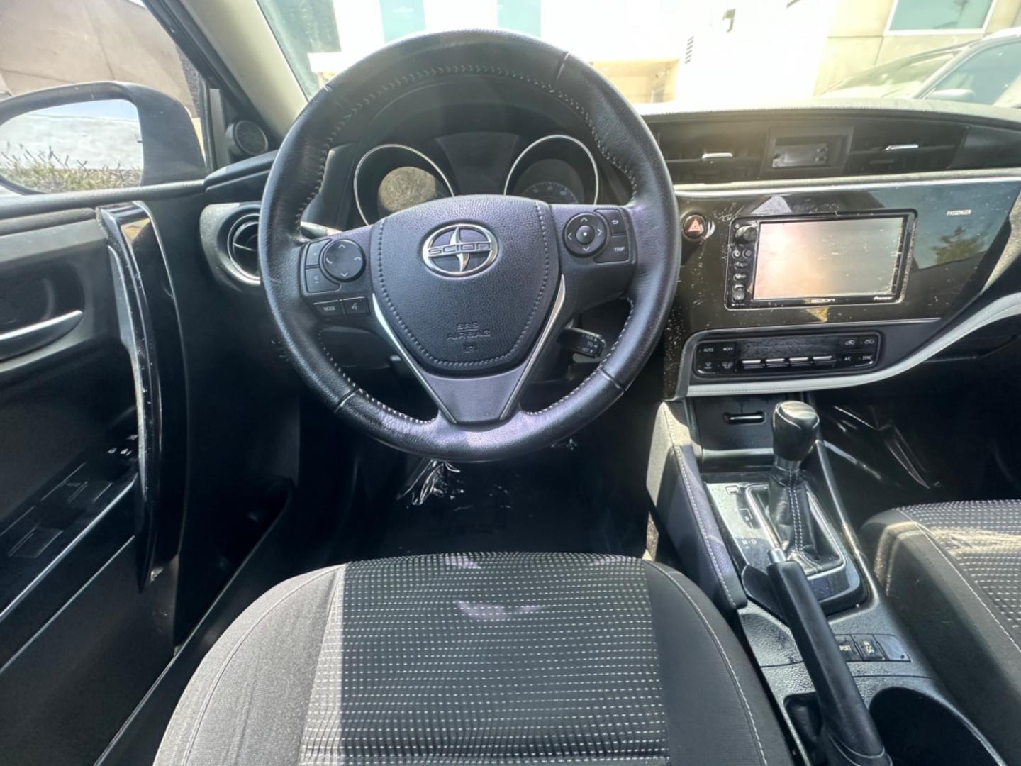 2016 Black /Black Scion iM Cloth (JTNKARJE7GJ) with an 1.8 4 Cylinder engine, Automatic transmission, located at 30 S. Berkeley Avenue, Pasadena, CA, 91107, (626) 248-7567, 34.145447, -118.109398 - 2016 Scion iM 1.8: Your Ideal Pre-Owned Hatchback in Pasadena, CA When searching for used BHPH cars in Pasadena, CA, the 2016 Scion iM 1.8 stands out as a premier choice. This versatile hatchback combines efficiency, style, and practicality, making it a highly sought-after vehicle in the pre-owned - Photo#14